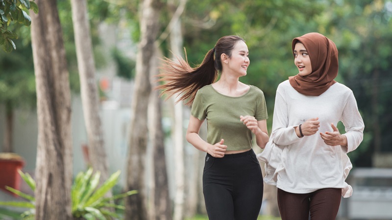 Muslim Asian women jogging